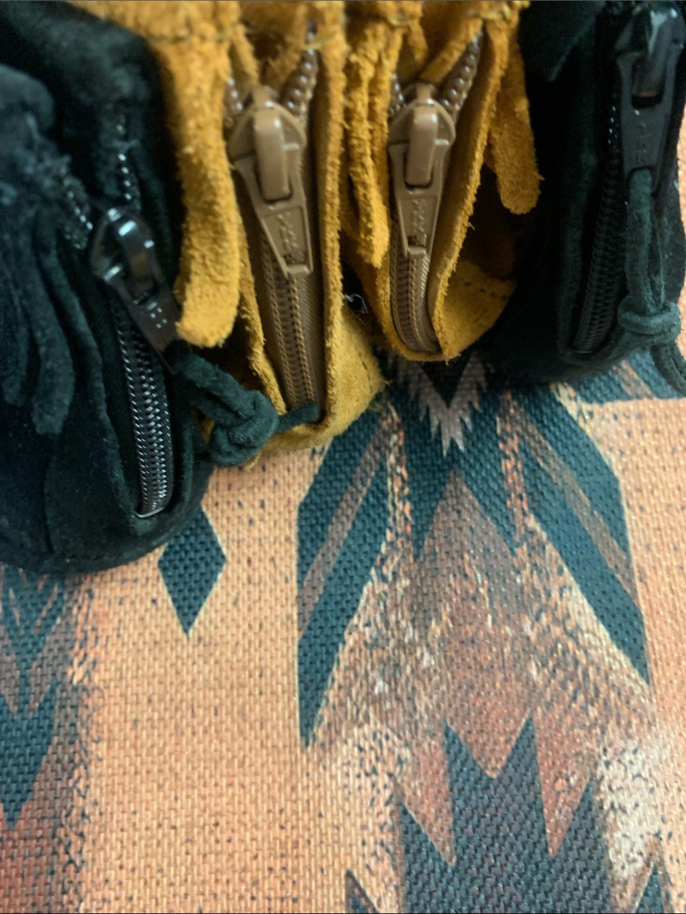 Minnetonka Fringe Moccasins in Tan and Black - Picture 4 of 11